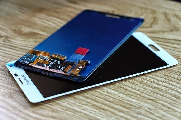 thay-mat-kinh-samsumg-galaxy-note4.JPG
